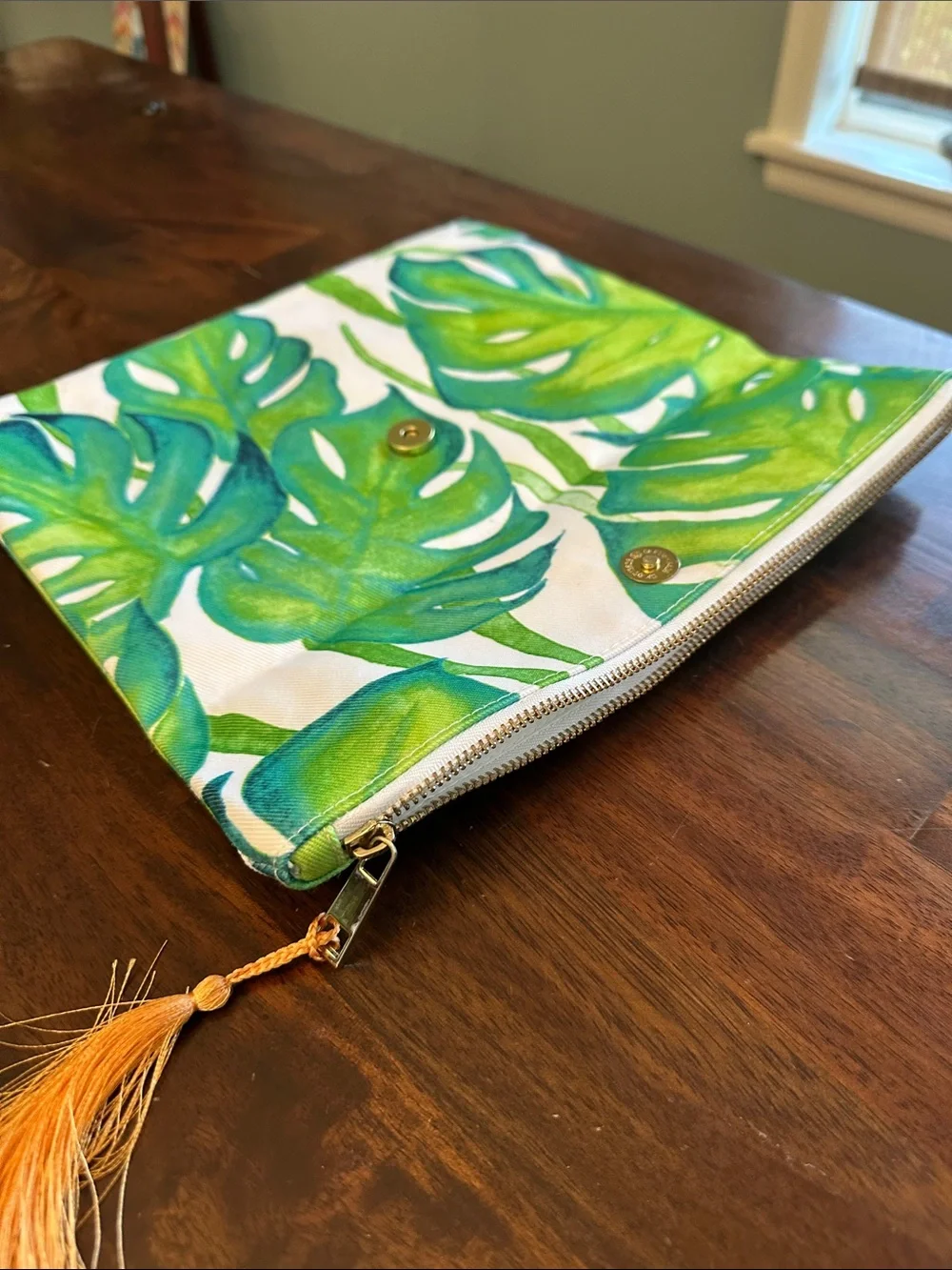 Pura Vida Green Leaf Canvas Clutch with Orange Tassel